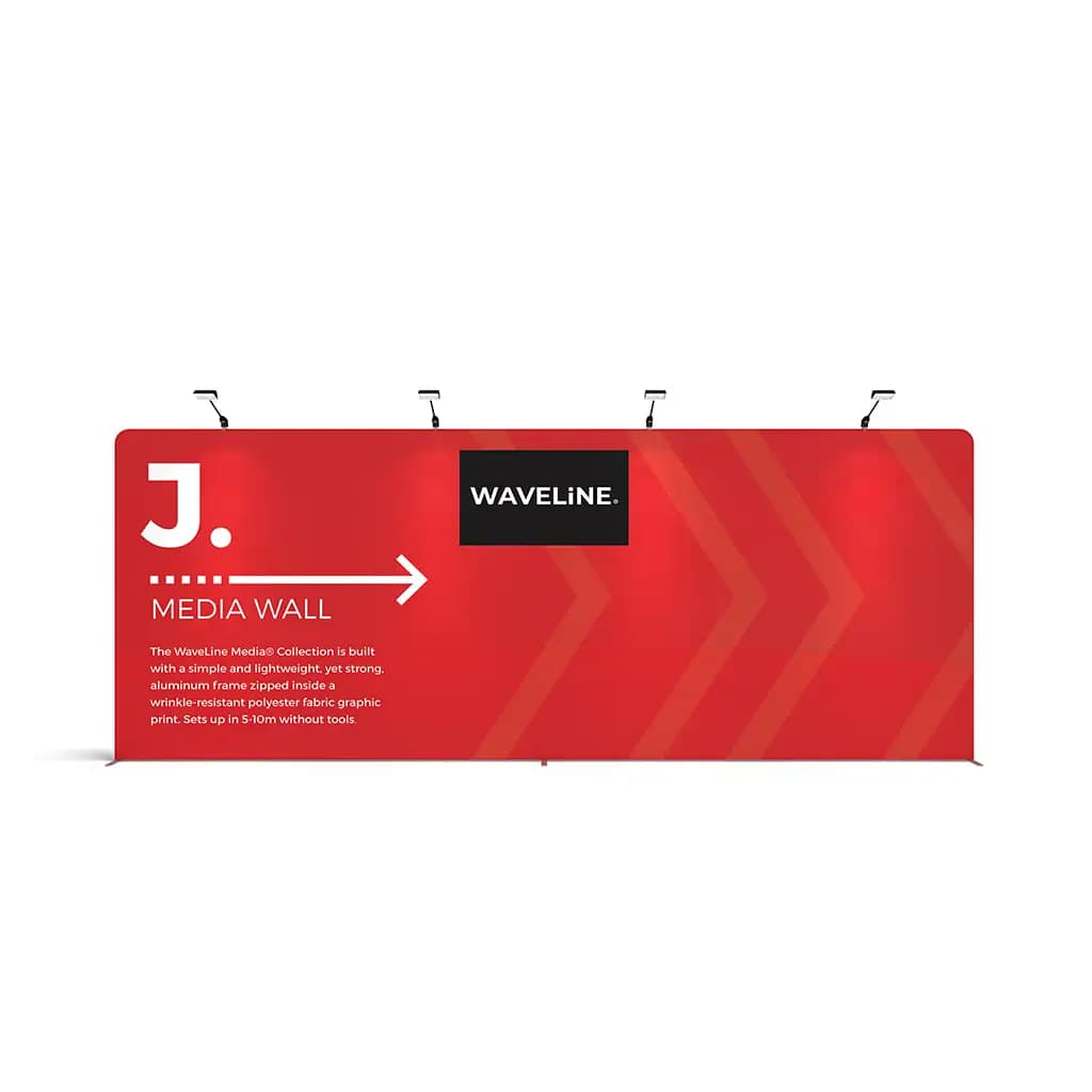 Brightly lit WaveLight® Tension Fabric Banner showcasing a media wall, ideal for impactful exhibition displays.