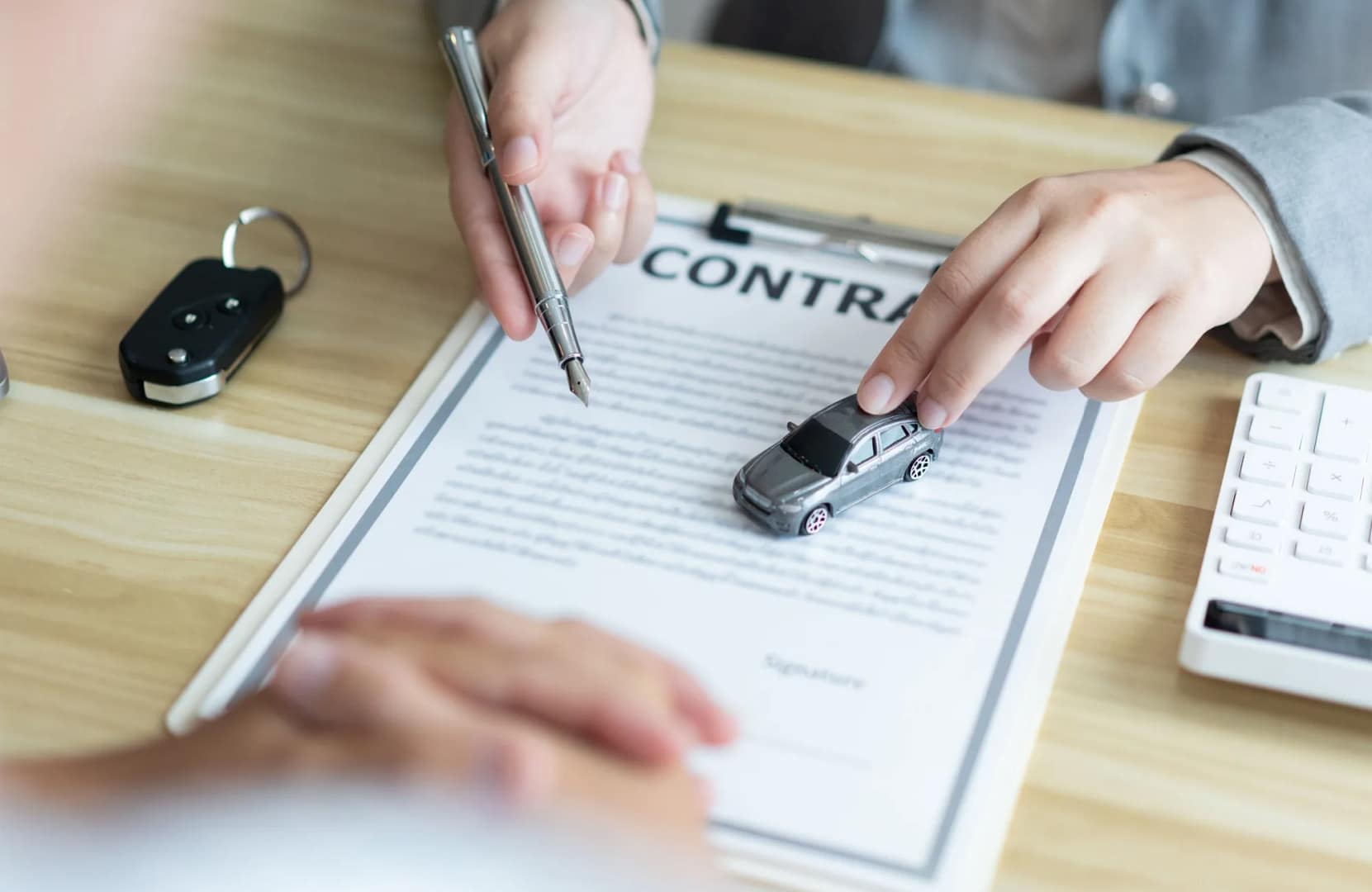 Insurance contract with toy cars