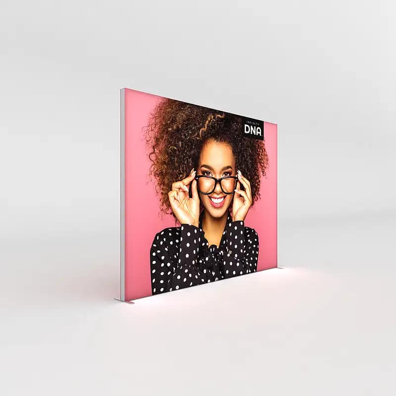 Brightly lit Infinity DNA™ Pro Lightbox displaying a smiling model, ideal for retail advertising and promotions.